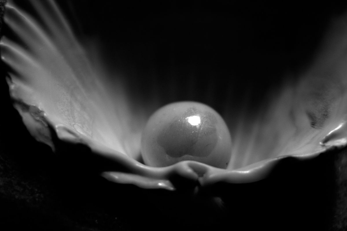 why-is-there-a-pearl-placed-on-the-mouth-of-the-deceased-singapore